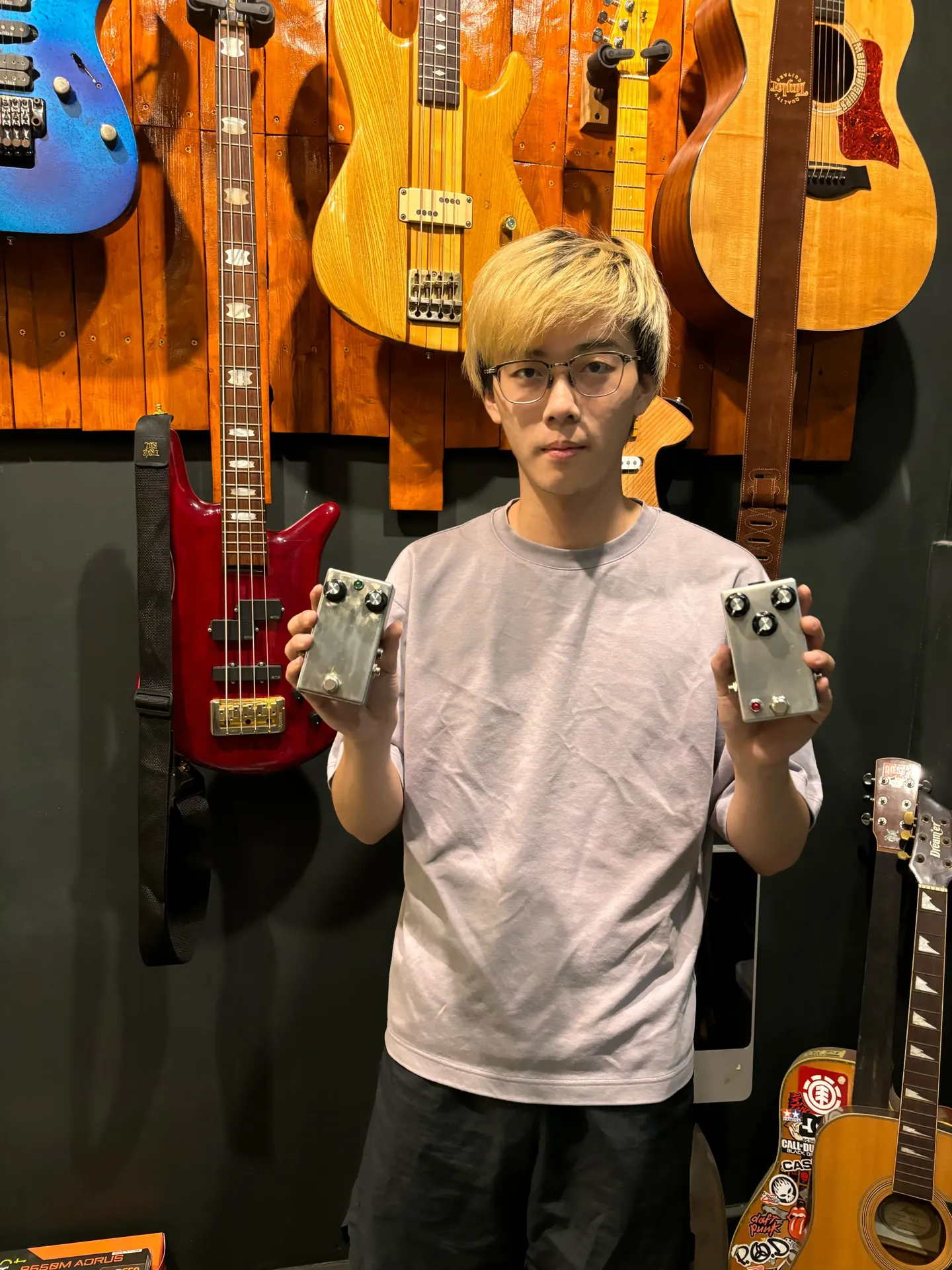 me holding guitar pedal
